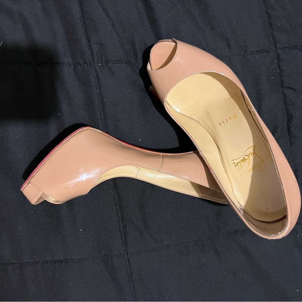 Red bottoms no shoe box (will be taken back to the store to be cleaned)